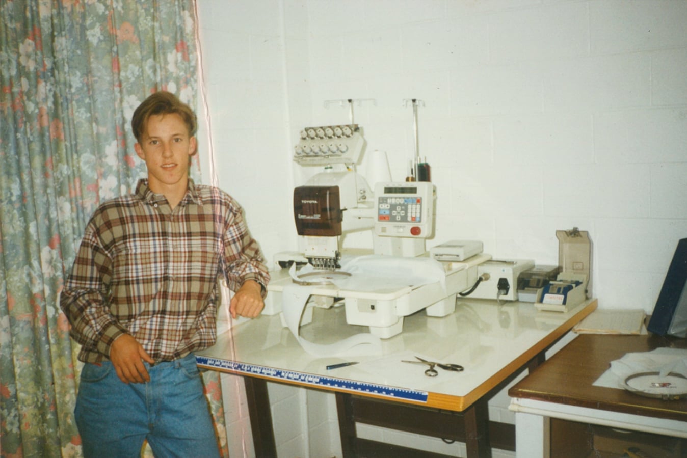 Campbell Lane with ALE's first embroidery machine in 1995