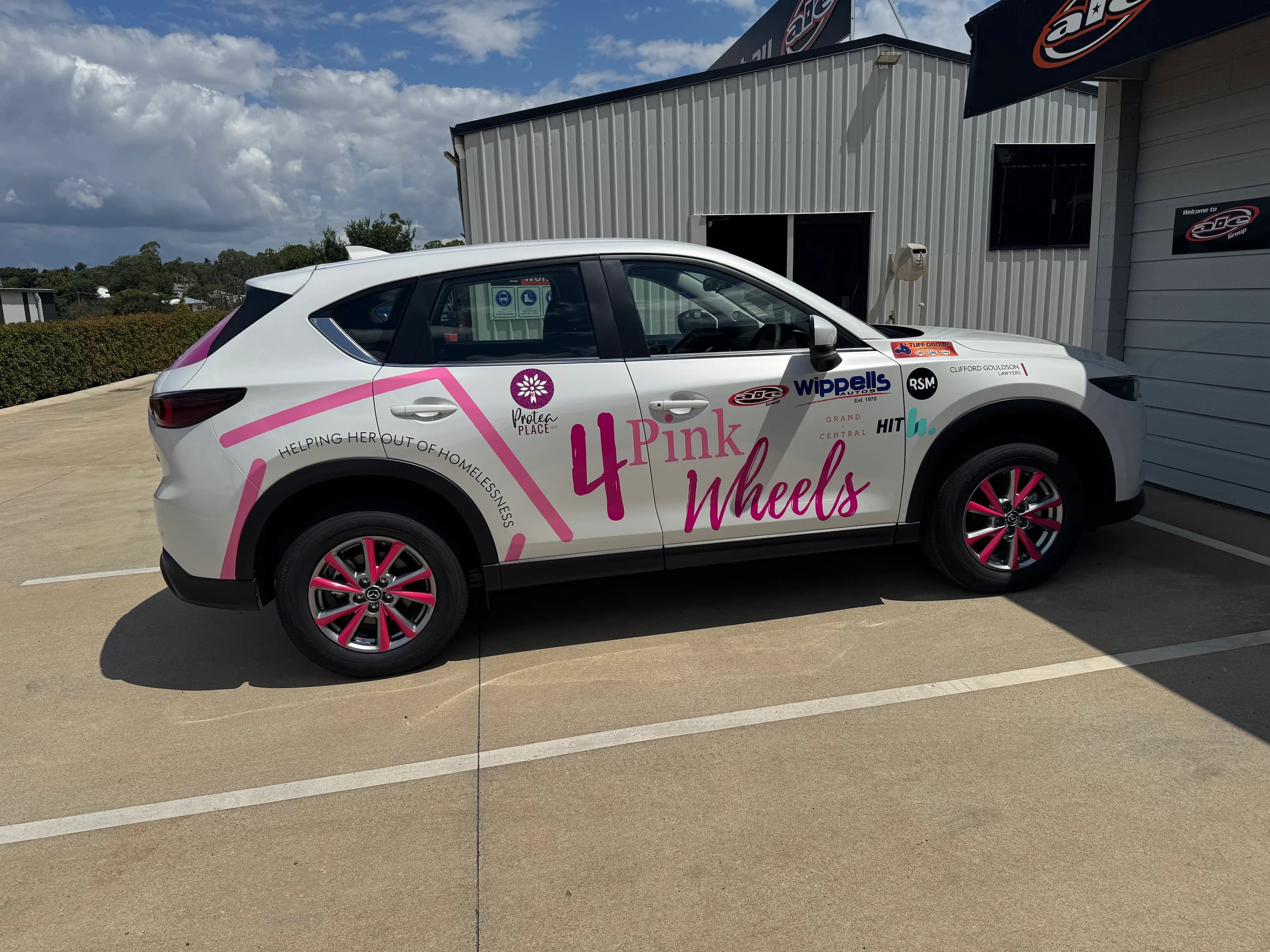 4 Pink Wheels wrapped SUV