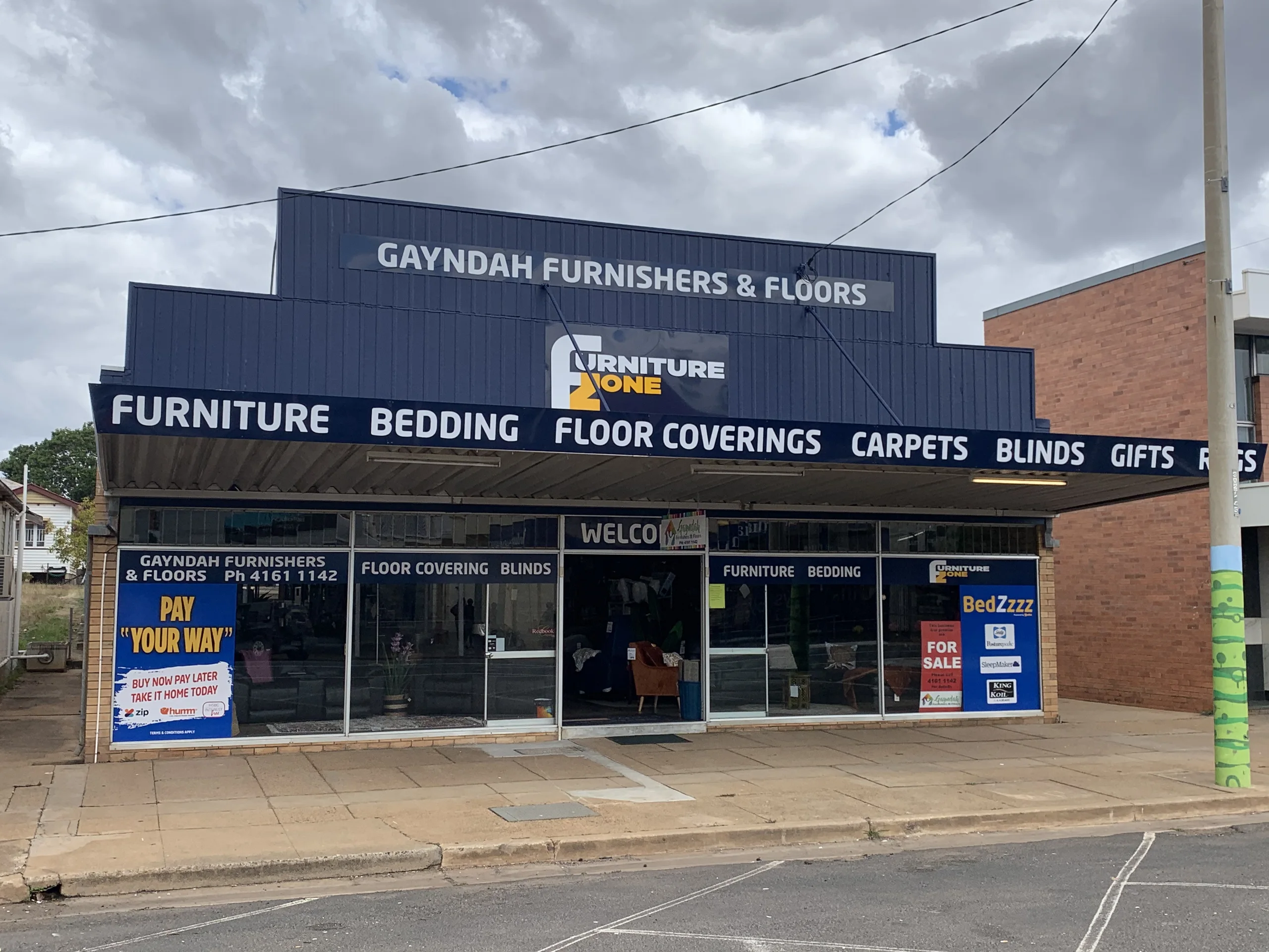 Gayndah Furnishers & Floors shopfront with the new Furniture One fascia