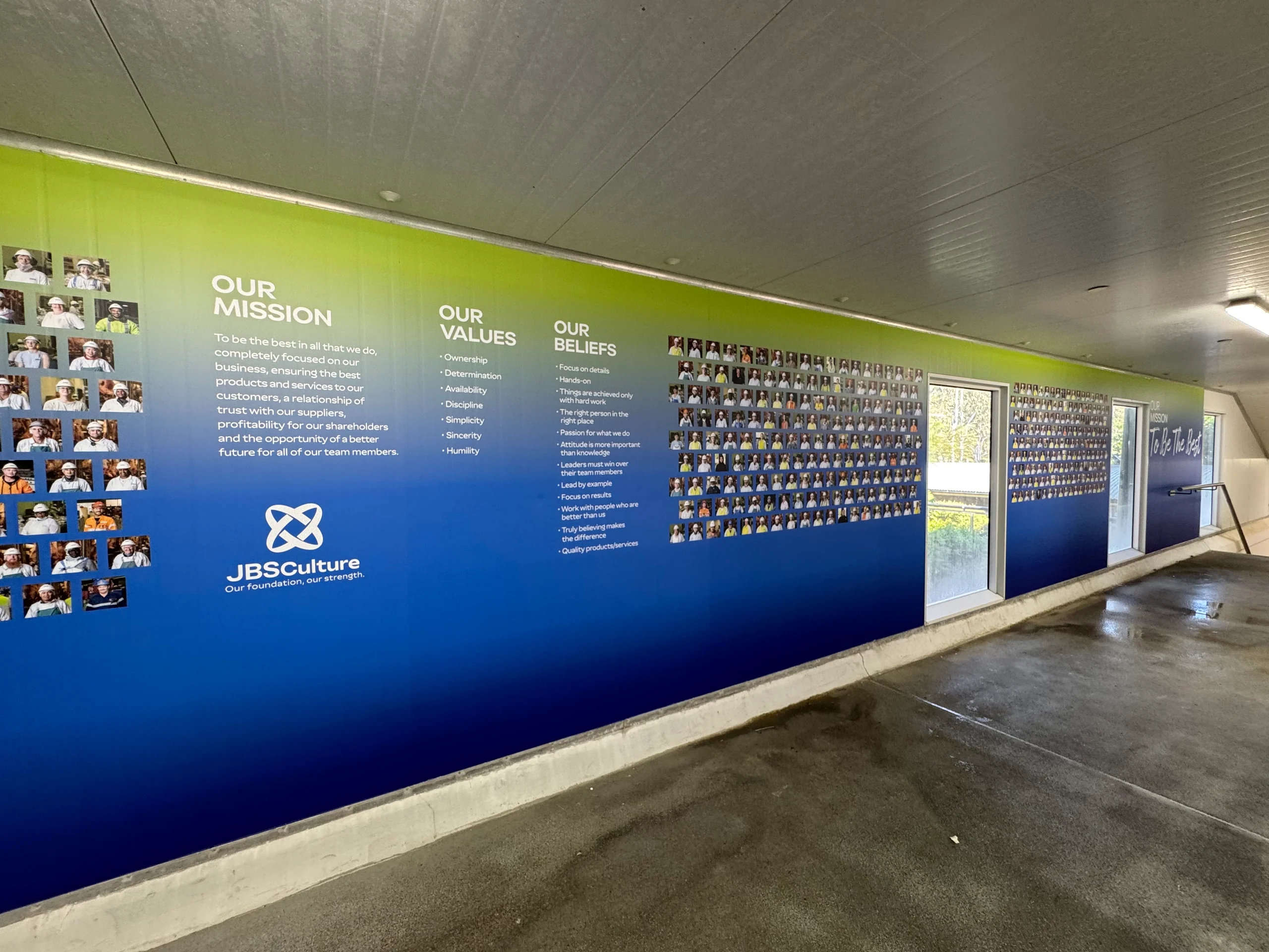 Full-length JBS culture wall at JBS Dinmore QLD