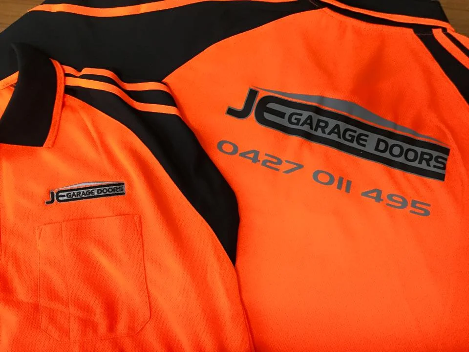 JC Garage Doors orange branded work shirts