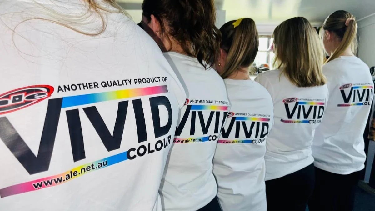 Staff wearing Vivid Colour printed shirts