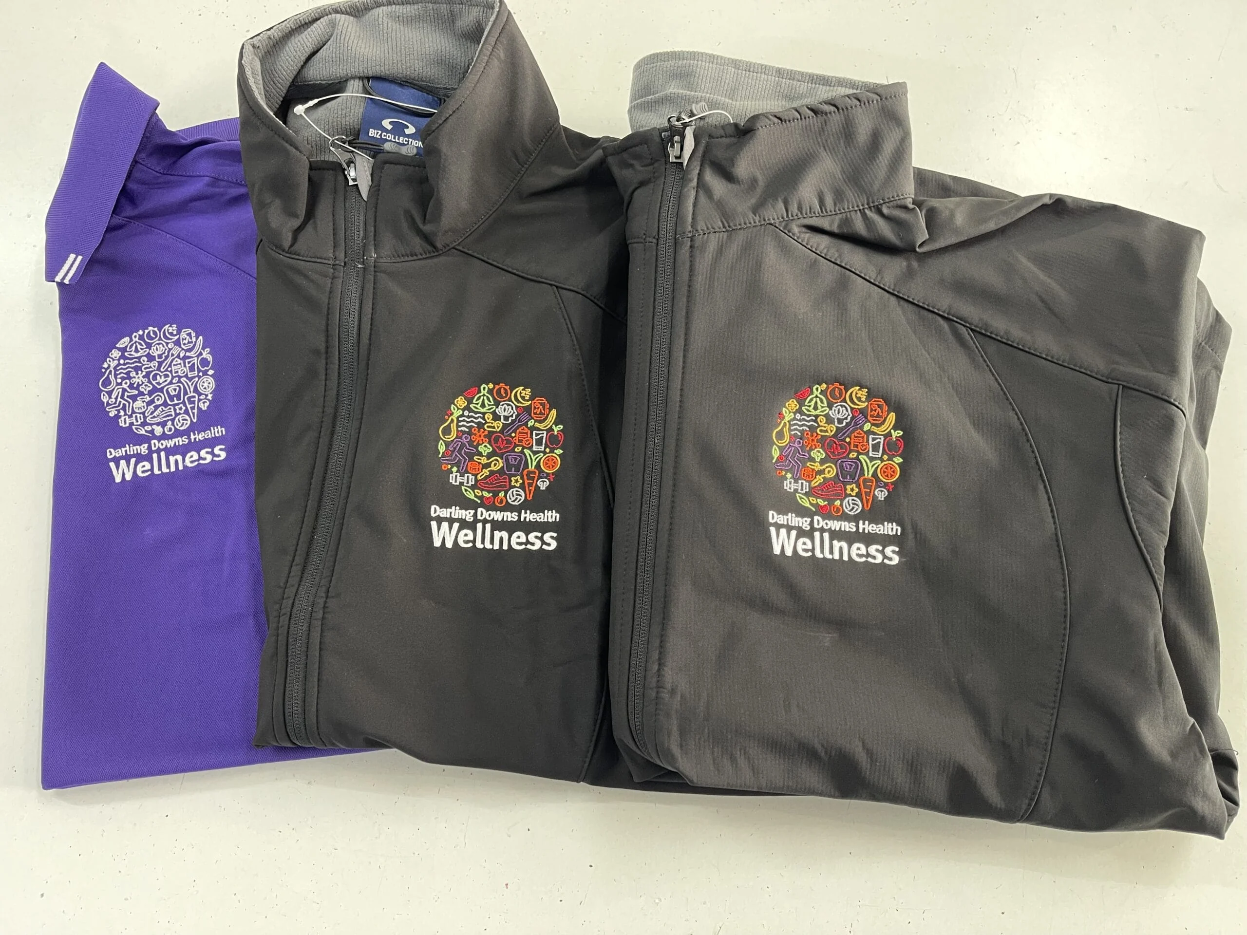 Embroidered wellness jackets and polo