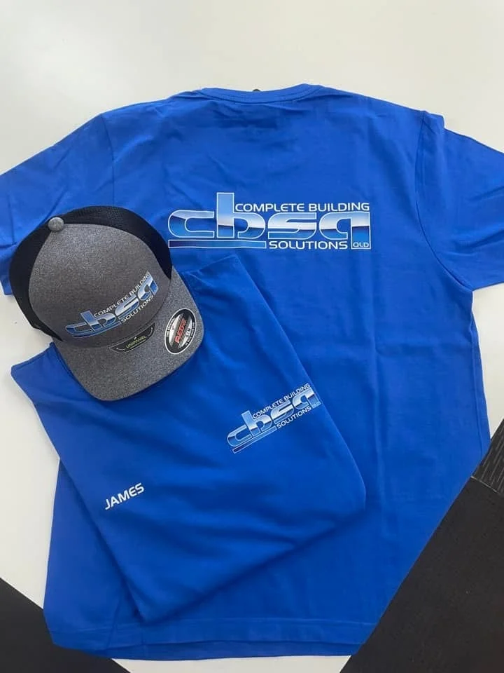 Branded tee and cap flat-lay